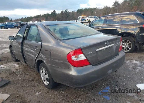 2003 Toyota Camry Le z USA, uszkodzony, nr VIN 4T1BE32K13U682017